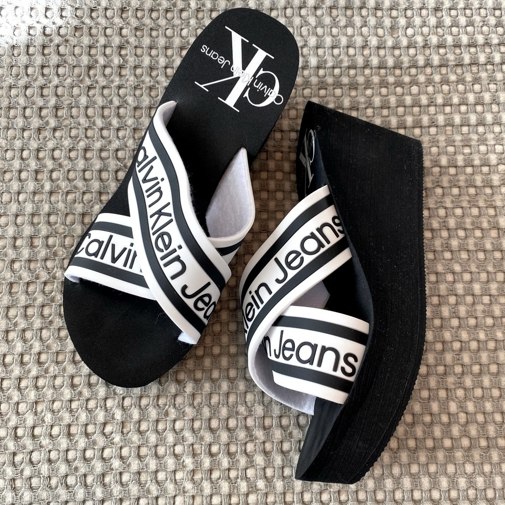 Calvin Klein Women’s Resort Wedge Slide